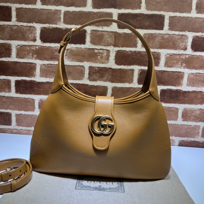 G*u*i top handle bags